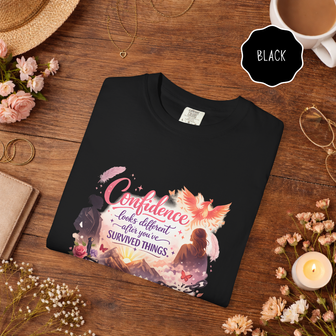 black survivor empowerment graphic tee with phoenix and confidence quote design