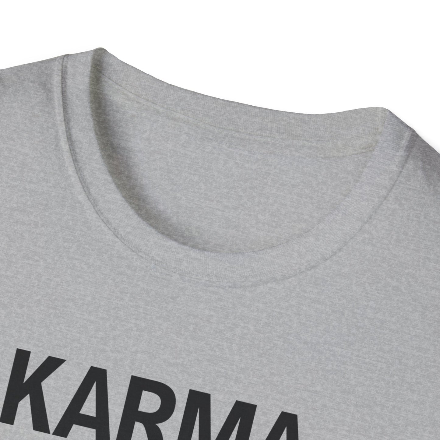 Close-up of karma quote text printed on soft white t-shirt