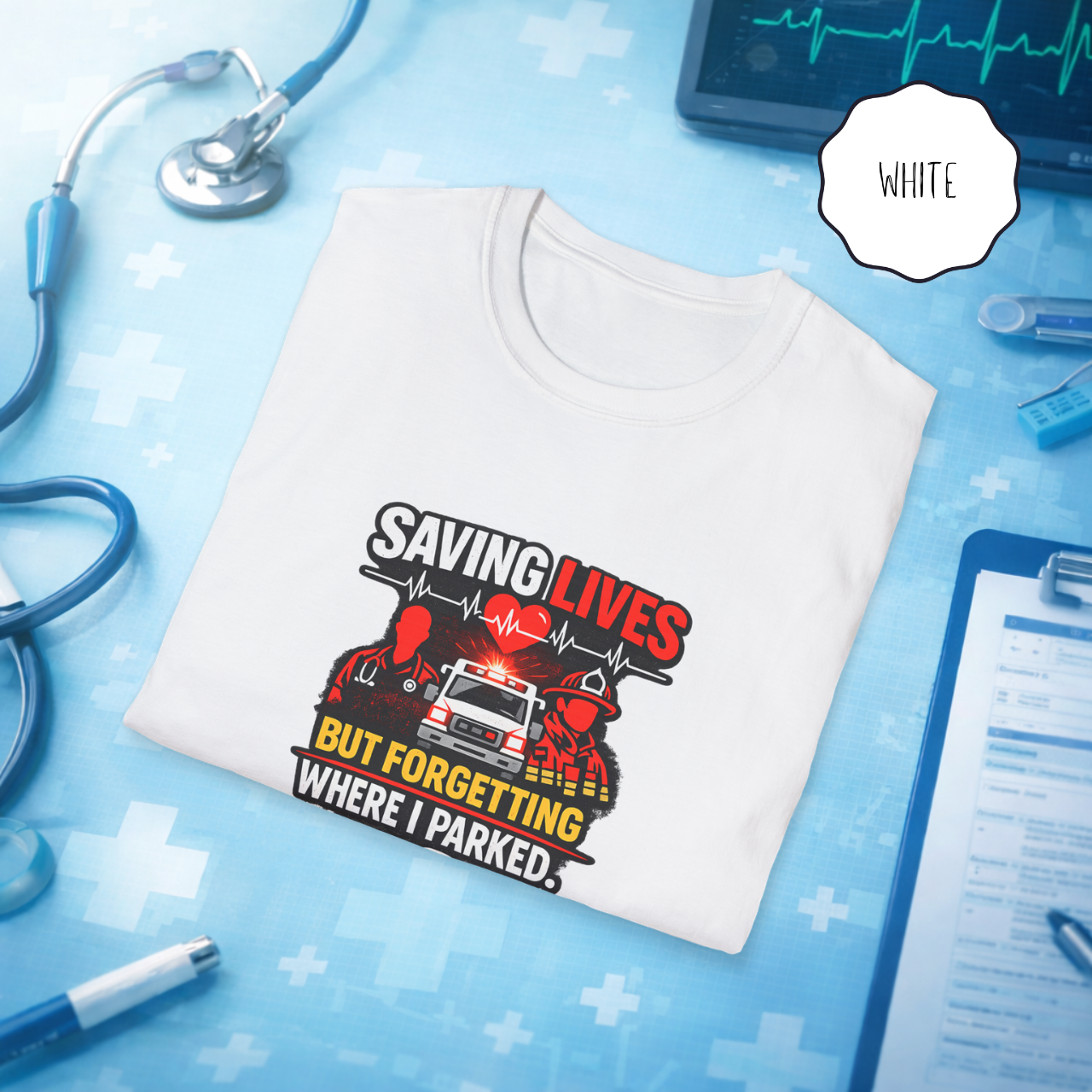 Folded nurse humor shirt in white Saving Lives But Forgetting Where I Parked on healthcare themed background with medical equipment